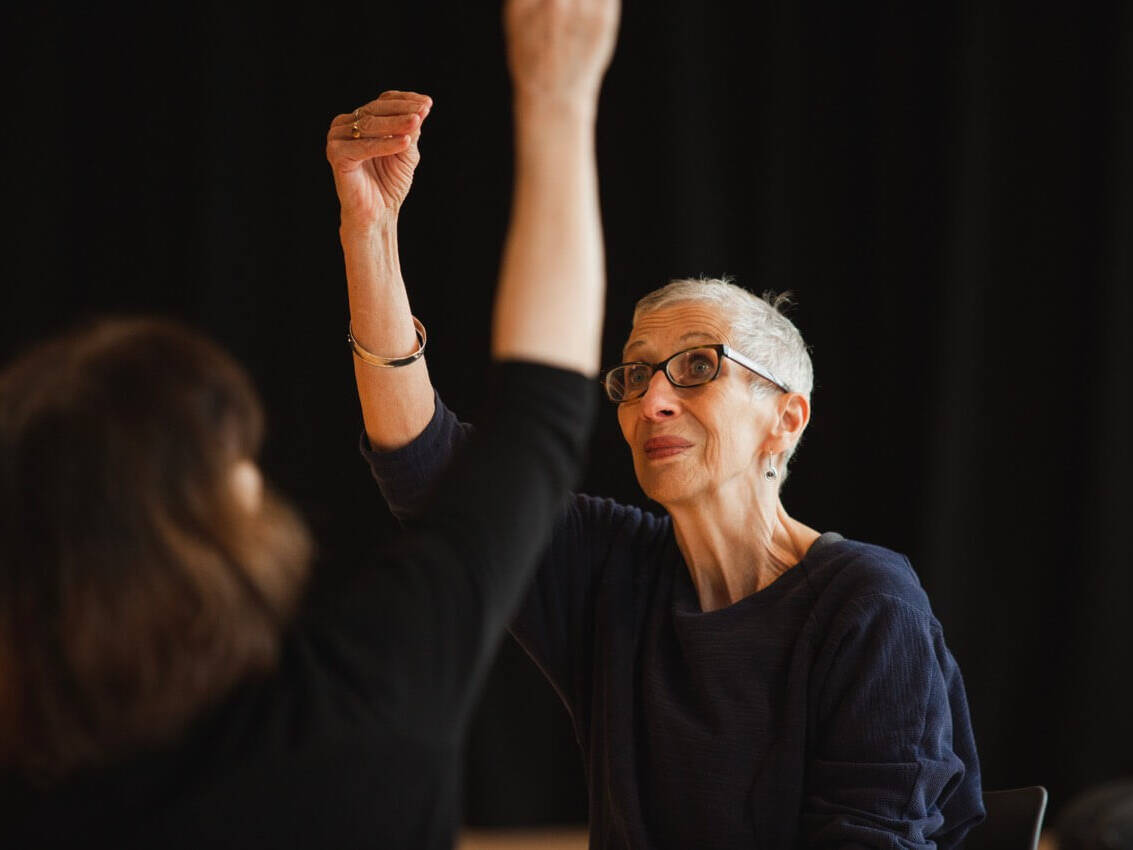Lady reaching up | Collective Identity