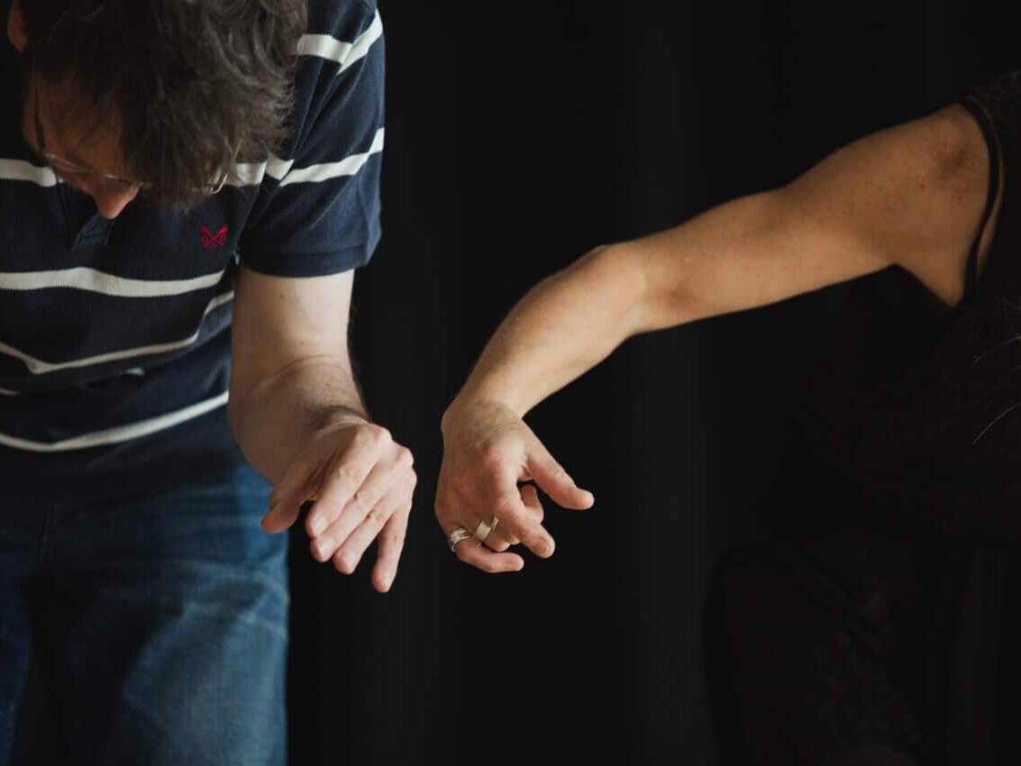Couple crouching | Collective Identity